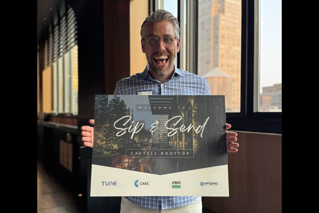 Garth Harris, COO of TUNE and CAKE, at Sip & Send happy hour during Affiliate Summit East 2025